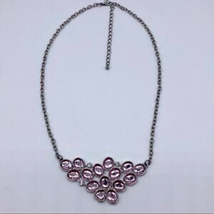 Stainless steel pendant with pink stones statement